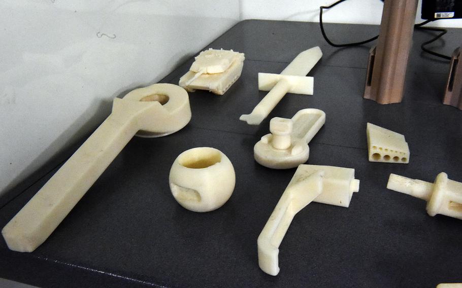 Tools and parts printed with the Army's Rapid Fabrication via Additive Manufacturing 3D-printing unit, Hohenfels, Germany, Tuesday, May 8, 2018.