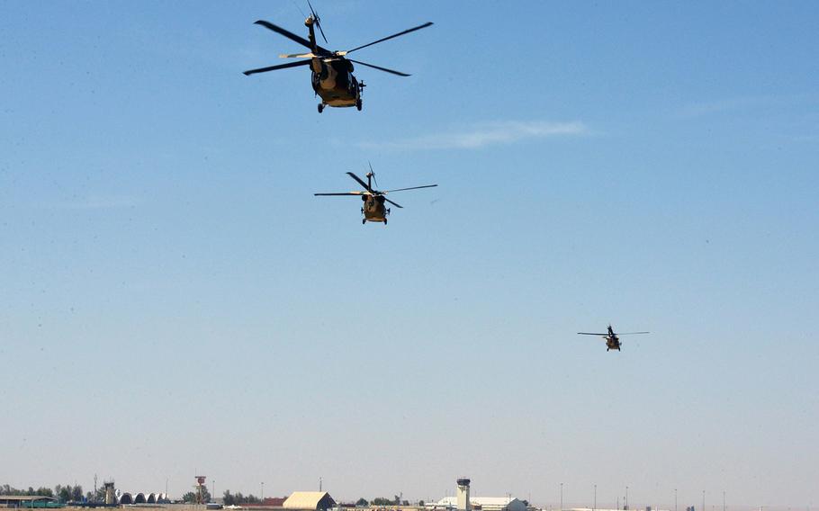 Three UH-60 Black Hawks take off to conduct the first Afghan-led operational mission on this aircraft May 8, 2018, Kandahar Air Field, Afghanistan. The mission, which was in support of the elections, occurred just one day after the crews graduated from Mission Qualification Training.