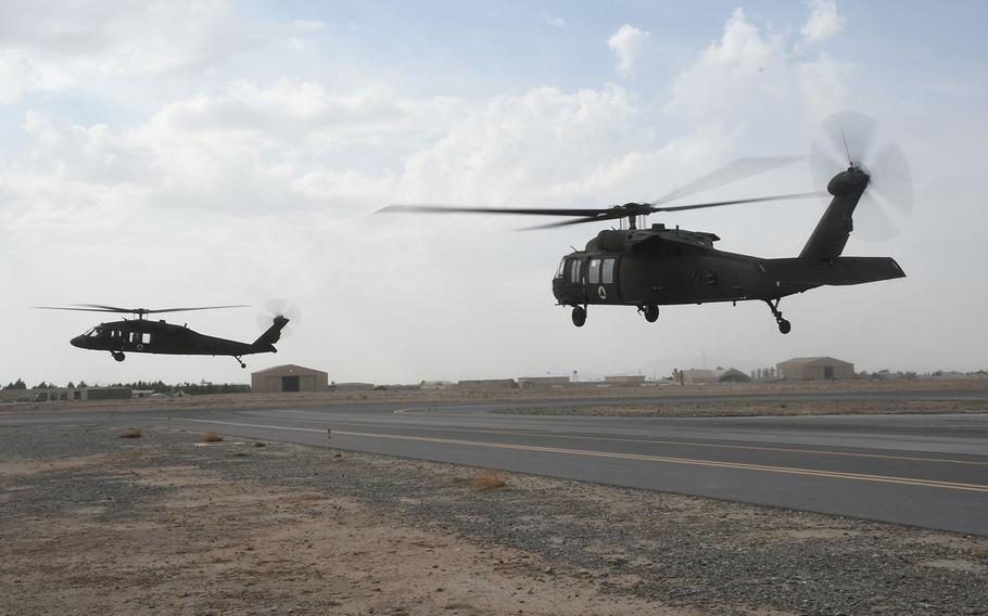 Afghan pilots learning to operate the UH-60 Black Hawk fly in the aircraft for the first time with U.S. contractors at Kandahar Air Field in March. Three UH-60s conducted the first Afghan-led operational mission on this aircraft May 8, 2018.