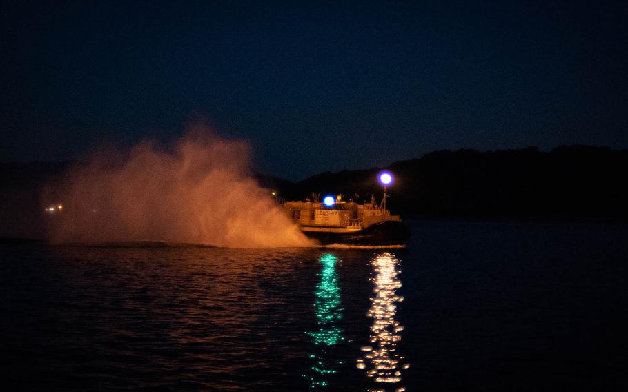 A landing craft air cushion, or LCAC, from Naval Beach Unit 7 returns from a night mission near Sasebo Naval Base, Japan, May 10, 2018.