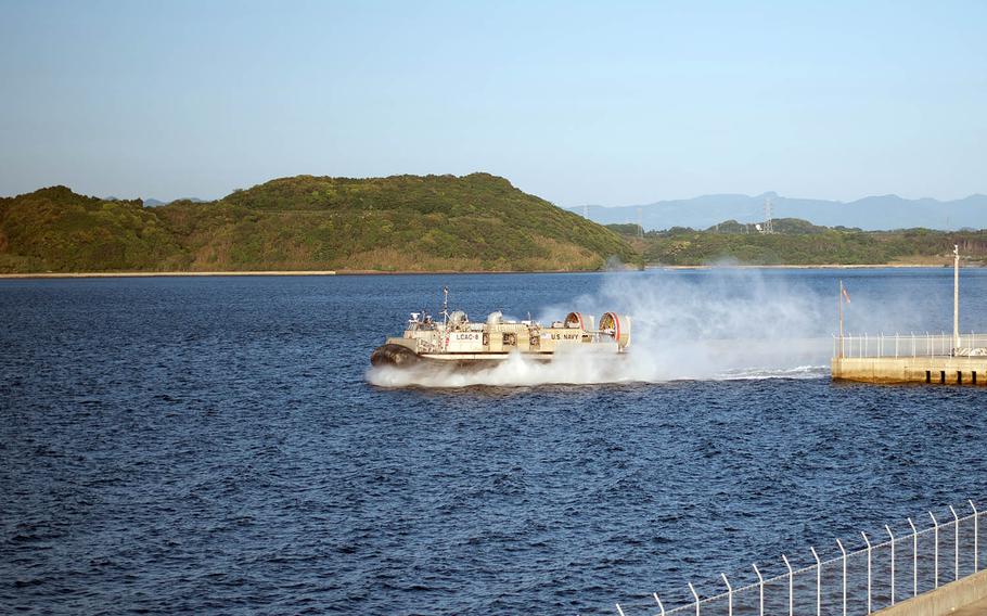 A hovercraft from Naval Beach Unit 7 launches from a port near Sasebo Naval Base, Japan, May 10, 2018.