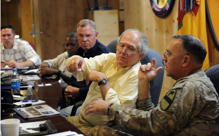 John F. Sopko, Special Inspector General for Afghanistan Reconstruction, speaks with Brig. Gen. Paul T. Calvert during a visit to Camp Gamberi, Afghanistan, May 18, 2017. SIGAR issued a report Thursday saying that U.S. efforts to pacify large parts of the country have failed.