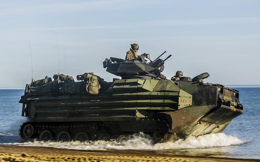 U.S. Marines of the 26th Marine Expeditionary Unit, drive an AAV-P7/A1 assault amphibious vehicle to a staging in preparation of amphibious operations during Baltic Operations 2018 at Ustka, Poland, June 8, 2018.