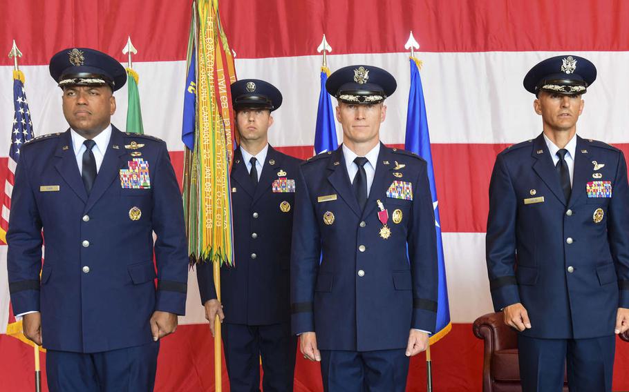 U.S. Air Force Lt. Gen. Richard Clark, left, th 3rd Air Force commander; Brig. Gen. Lance Landrum,center, outgoing 31st Fighter Wing commander; and Brig. Gen. Daniel Lasica, 31st Fighter Wing commander, stand during a change-of-command ceremony at Aviano Air Base, Italy, Thursday, June 21, 2018. 
                