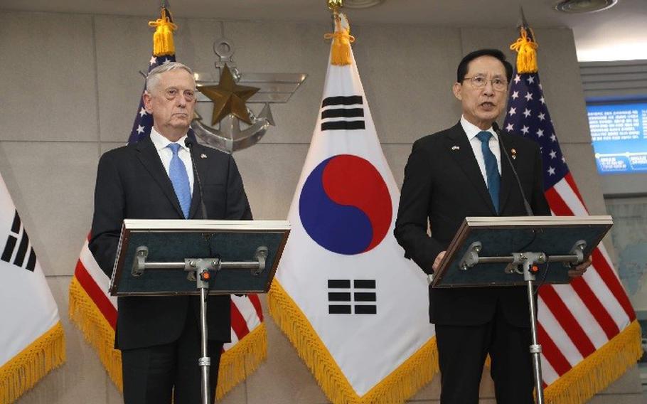Defense Secretary Jim Mattis, left, and South Korean Defense Minister Song Young-moo make remarks before holding talks at the defense ministry in Seoul, South Korea, on Thursday, June 28, 2018.
