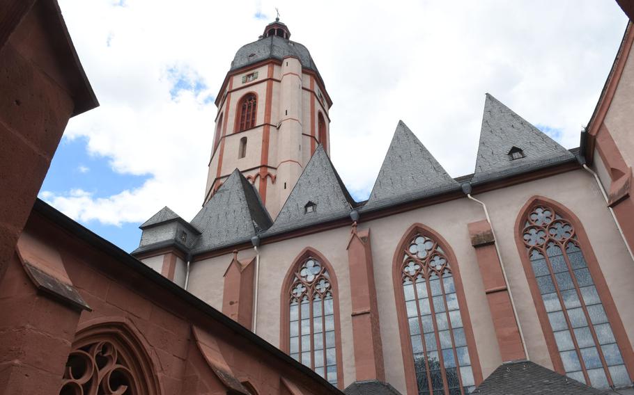 St. Stephan's church sits above the old town in Mainz, Germany. The Gothic church has a simple facade but its interior is unique, due to the nine Marc Chagall stained-glass windows, the only collection of its kind in Germany.
