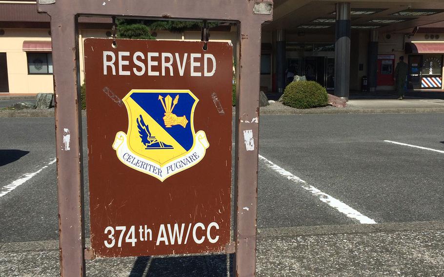A sign denoting the wing commander's reserved parking space is usually only hung when the wing commander has official business at the Enlisted Club.