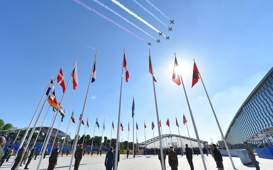Jets do a flyover at the new NATO headquarters handover ceremony during last year's meeting of NATO heads of state and government in Brussels. Next week, heads of state will again gather in Brussels for a major summit.
