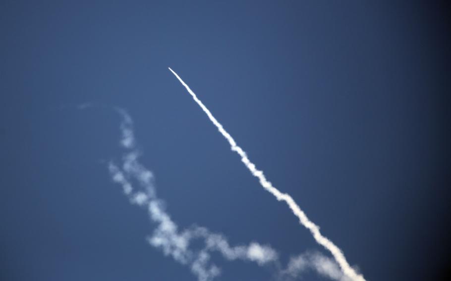 Missiles launch toward a ship 60 miles off of Barking Sands Pacific Missile Range, Hawaii, on Thursday, July 12, 2018.