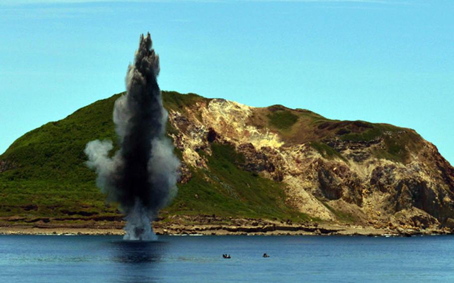 This photo provided by the Japan Maritime Self-Defense Force shows a minesweeping drill conducted in 2017 by the United States and Japan.