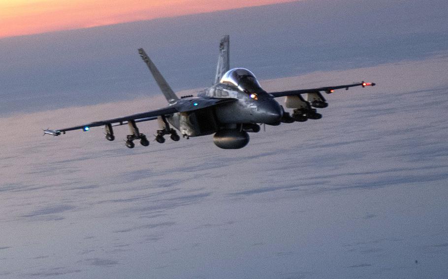 A U.S. Navy F/A-18E/F Super Hornet over Afghanistan Dec. 7, 2017. The Super Hornets conducted a series of precision airstrikes against six Taliban narcotic targets in Helmand province, Afghanistan.