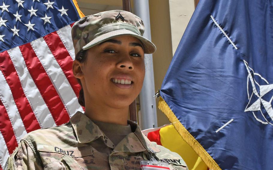 Army Cpl. Ruby Cruz celebrates Independence Day at NATO's Resolute Support headquarters on Wednesday, July 4, 2018. Cruz, 24, with the Puerto Rico Army National Guard, deployed to Afghanistan after Hurricane Maria devastated the island last fall.
                