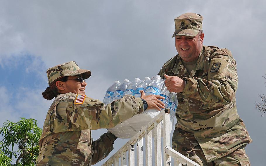 Soldiers of the Puerto Rico Army National Guard distribute supplies, food and water to affected communities around the island of Puerto Rico in the aftermath of Hurricane Maria, Nov 2, 2017. 
                