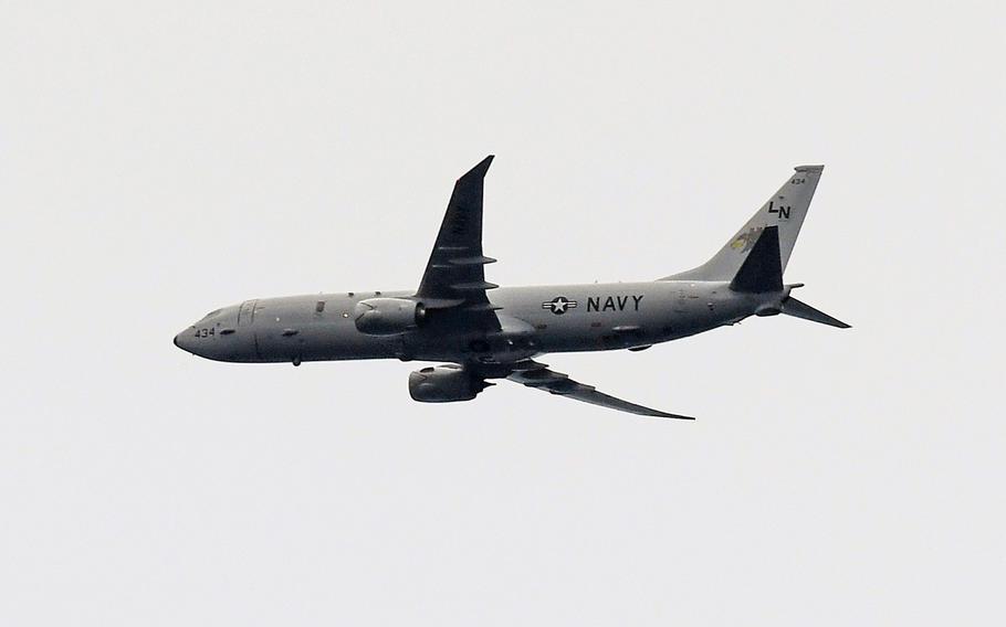 A U.S. Navy P-8A Poseidon flies over the Mediterranean Sea in March 2017. A Navy Poseidon and a Air Force MQ-9 drone are searching for hot spots in Greece, where wildfires tore through a coastal village earlier this week.