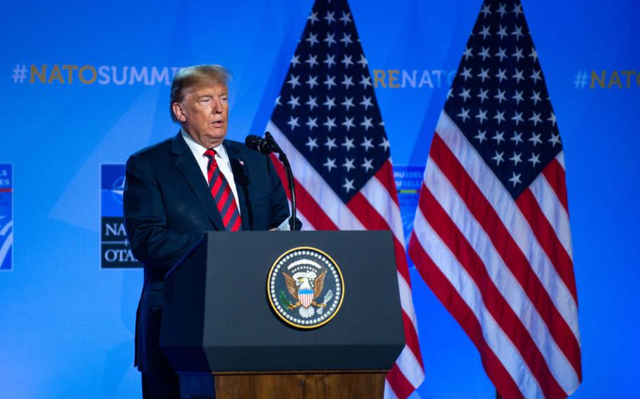 President Donald Trump speaks at a news conference at the NATO summit in Brussels, July 12, 2018. A group of senators has proposed a bill that would prohibit a U.S. president from leaving the alliance without Senate consent.