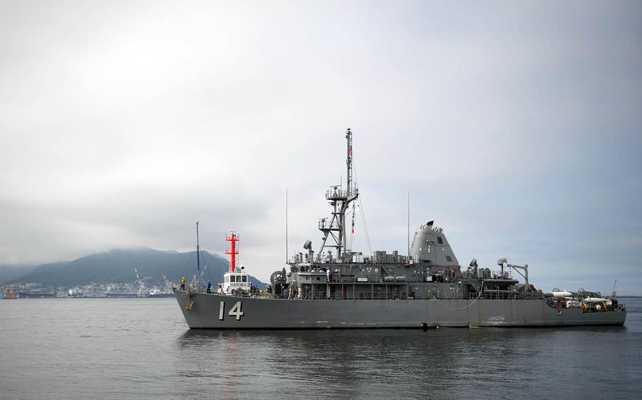 The Avenger-class minesweeper USS Chief pulls into Hakodate, Japan, July 14, 2018.
