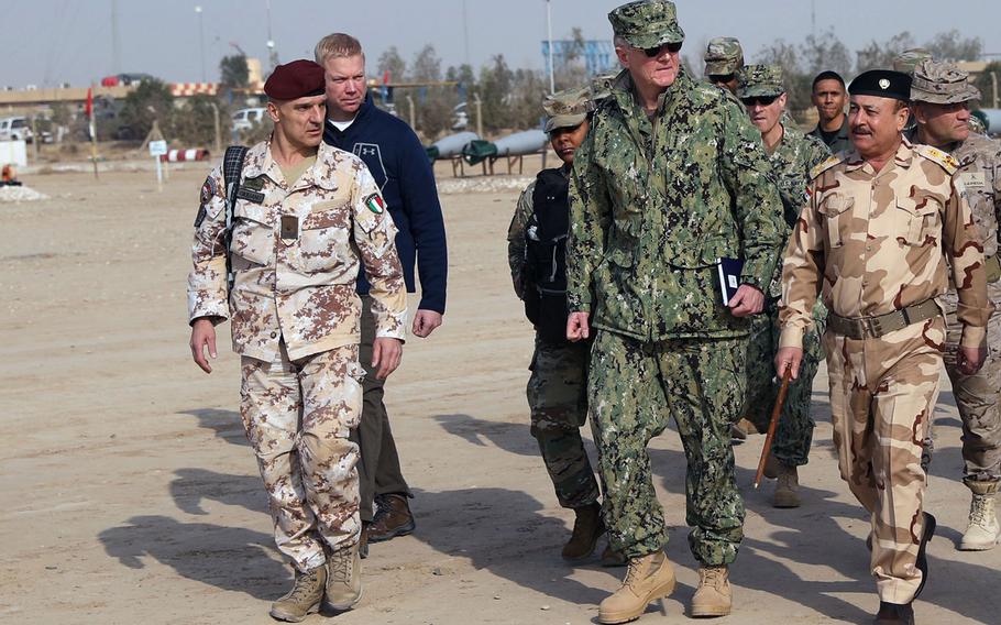 U.S. Navy Admiral James Foggo, commander of Allied Joint Force Command, visits the Iraqi Bomb Disposal School at the Besmaya Range Complex, Iraq, Feb. 7, 2018. Foggo says NATO is sending 200 personnel to Iraq to train security forces to combat the Islamic State.