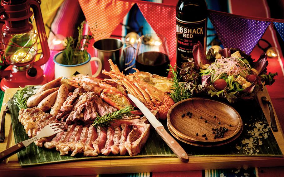 The premium course at Barvelous features grilled steak, grilled shrimp, lobster, sausage, soup and salad.