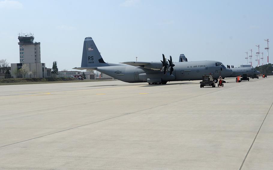 A pair of C-130 Hercules cargo planes sit on the tarmac at Ramstein Air Base, Germany. U.S. military bases in Europe rely heavily on host nation energy, which in turn often relies on Russian oil and gas.