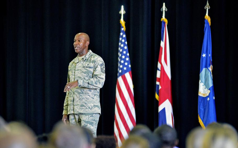 Chief Master Sergeant of the Air Force Chief Kaleth O. Wright speaks to airmen about coming policy changes during a town hall at RAF Lakenheath, England, Wednesday, Aug. 1, 2018.