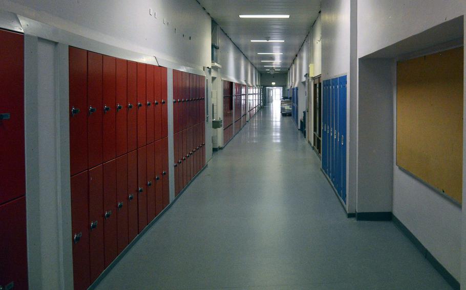 A hallway in the old Kaiserslautern High School. For the first time in more than 65 years, high school students won't be walking past the red and blue lockers, as a new school is set to open at the beginning of the school year.