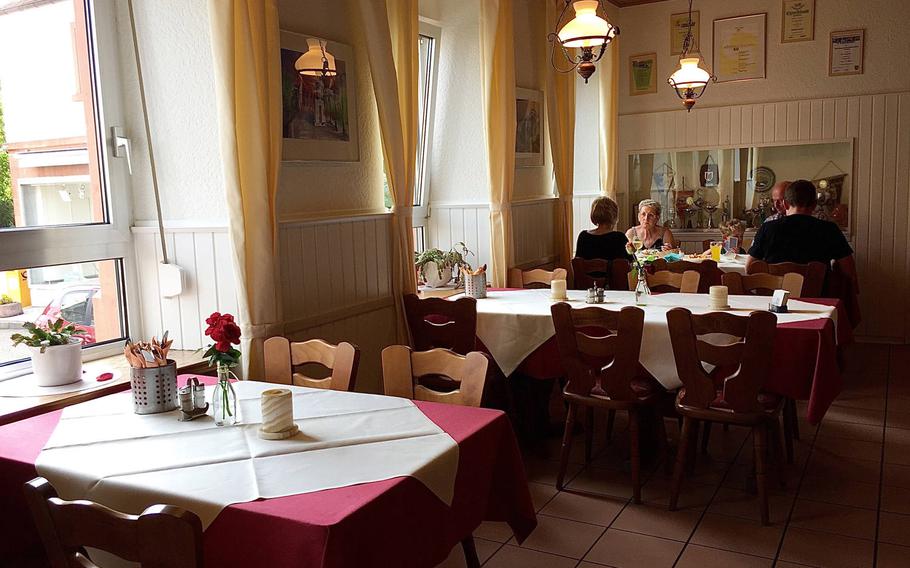 The inside of Zur Feiermaus a traditional German restaurant located on the outskirts of the village of Siegelbach looks like a German living room or dinning room with amazing food to match.