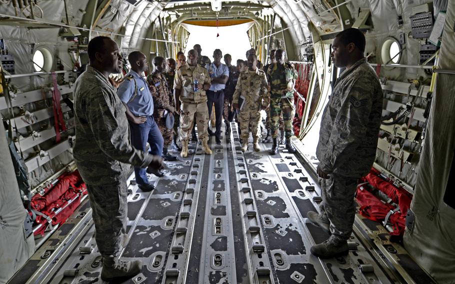 Military members from seven African countries are shown a C-130 during the African Partnership flight at Ramstein Air Base, Germany, Tuesday, Aug. 7, 2018. The weeklong engagement aims to build relationships.