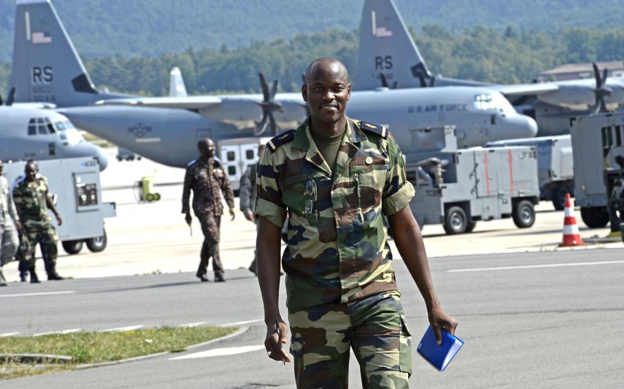 Senegal air force Senior Master Sgt. Dethie Diouf walks off the Ramstein Air Base sightline during the African Partnership flight, Tuesday, Aug. 7, 2018.