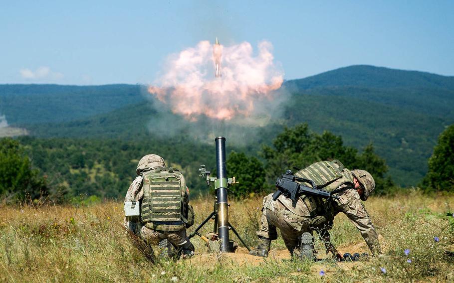 Montenegrin soldiers fire an 81mm mortar during Exercise Platinum Lion 18 at Novo Selo Training Area, Bulgaria, Aug. 3, 2018.