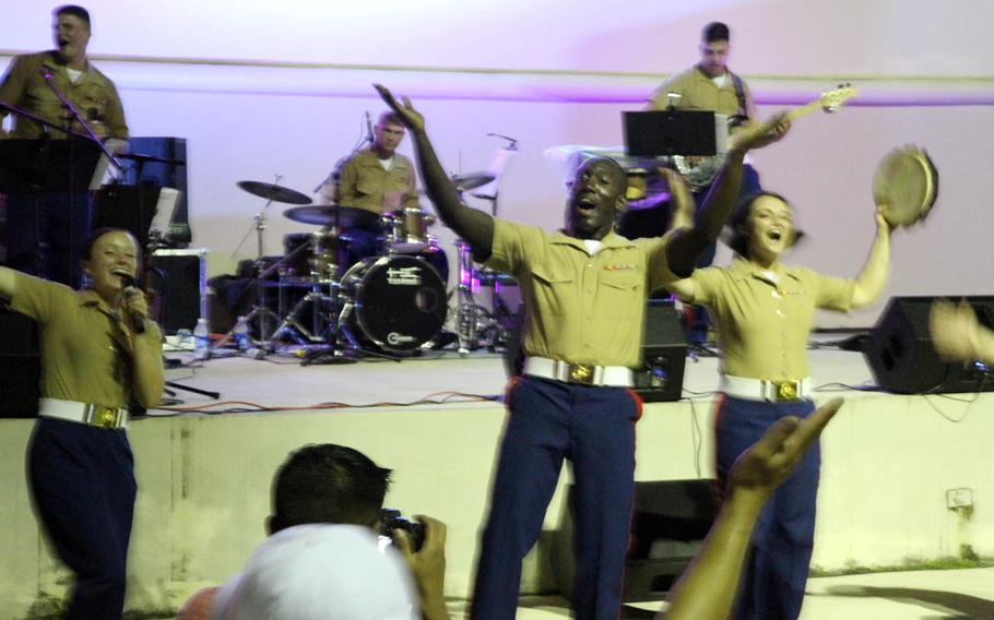 Adapt and Overfunk, which is made up of members of the III Marine Expeditionary Force Band, perform the Village People classic "Y.M.C.A" last month on Guam.