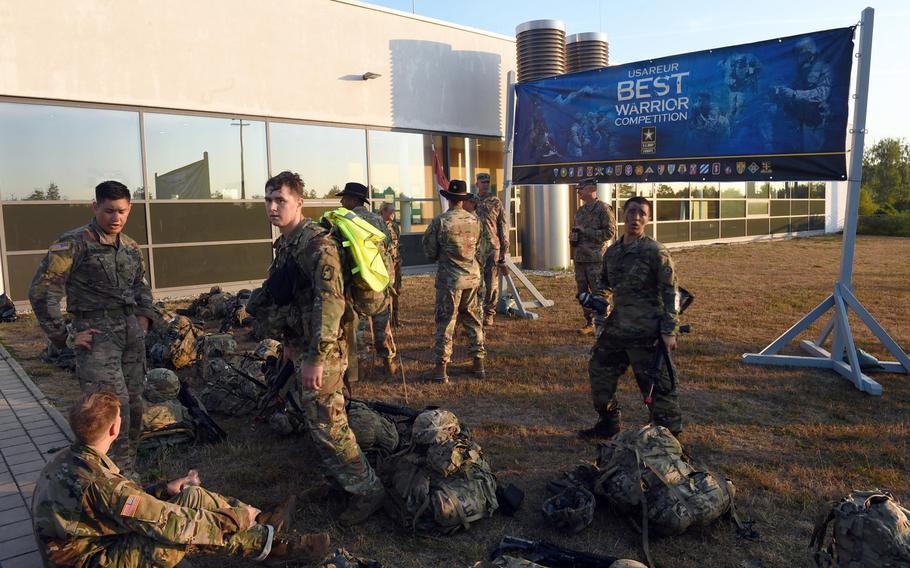 Soldiers rest between events near the base gym at the 2018 U.S. Army Europe Best Warrior Competition, Friday, Aug. 17, 2018, at Grafenwoehr, Germany.