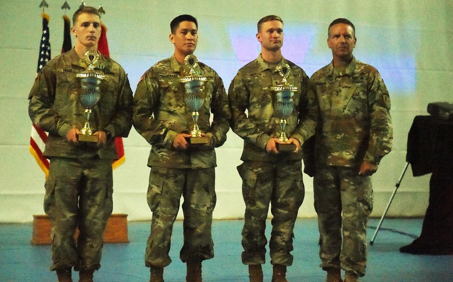Maj. Gen. Andrew Rohling, right, the deputy commanding general of U.S. Army Europe, stands with the 2018 U.S. Army Europe Best Warrior winners Lt. Robert Martin, Staff Sgt. Cesar Gonzalez, and Spc. Jacob Root, at Grafenwoehr, Germany, Friday, Aug. 17, 2018.