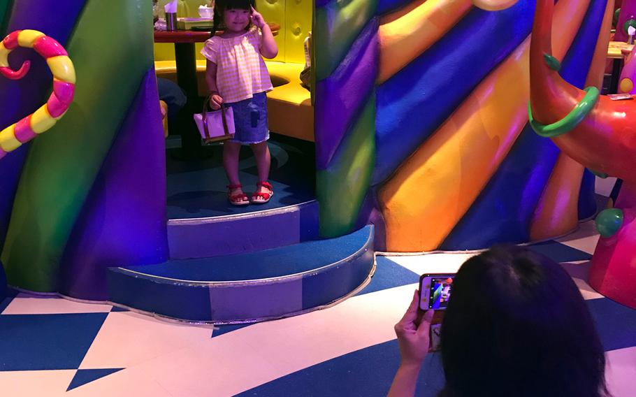 Guests at Kawaii Monster Cafe in the trendy Tokyo neighborhood of Harajuku are free to explore and take photographs inside the uniquely decorated space.