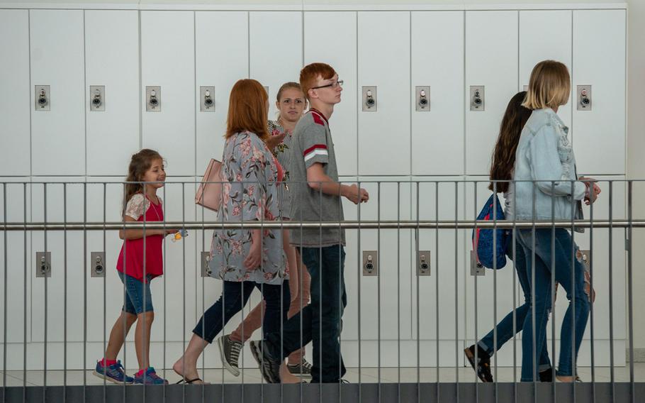 Teens and parents take a tour of the new Kaiserslautern High School during an open house on Friday, Aug. 24, 2018. Classes begin at the school on Monday, Aug. 27.