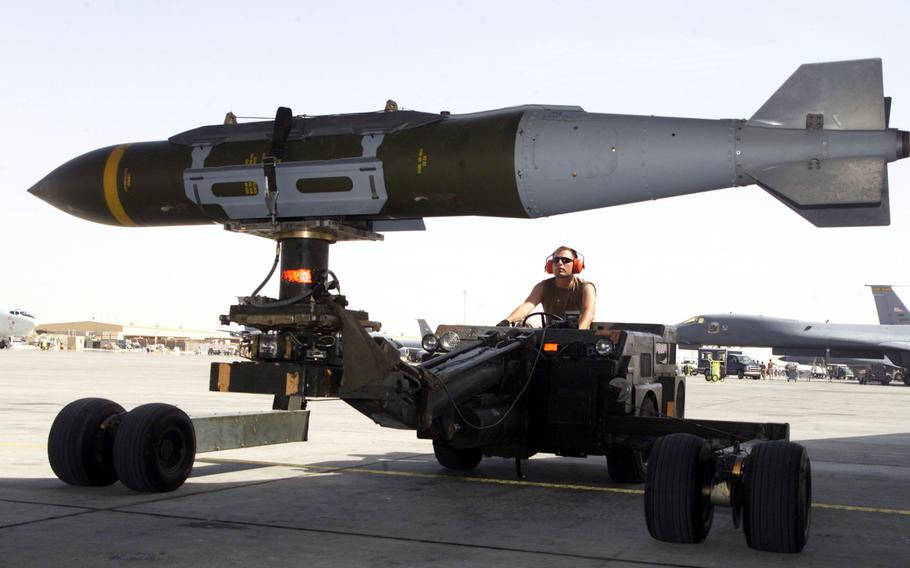 A weapons loader prepares a GBU-31 joint direct attack munition for a mission. On Wednesday, Aug. 22, 2018, the NATO Support and Procurement Agency received its first lot of precision-guided munitions, which will be delivered to Belgium and Denmark as part of an alliance project to build up stockpiles.