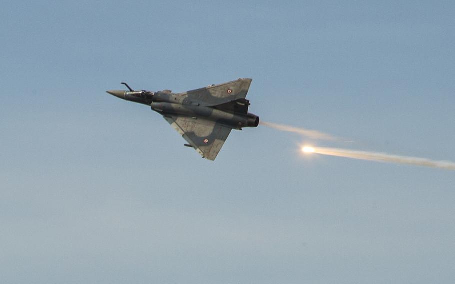 A French Mirage fighter aircraft drops flares during a French live-fire demonstration near Arta Plage, Djibouti, Jan. 14, 2017. An attack by French warplanes and commandos against a terrorist camp in a Mali killed the leader of a group that claimed responsibility for the deadly 2017 ambush on U.S. troops in Niger.