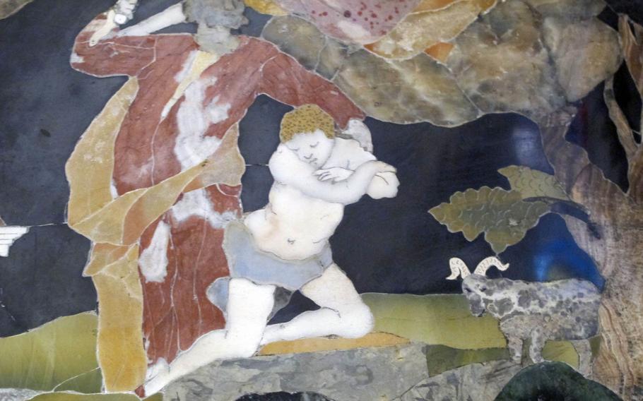 Among the beautiful art works in Vicenza's Chiesa di Santa Corona is the fabulous mosaic altar depicting scenes from the Bible as well as fanciful flowers and animals. Here, Abraham is about to slay his son, Issac.