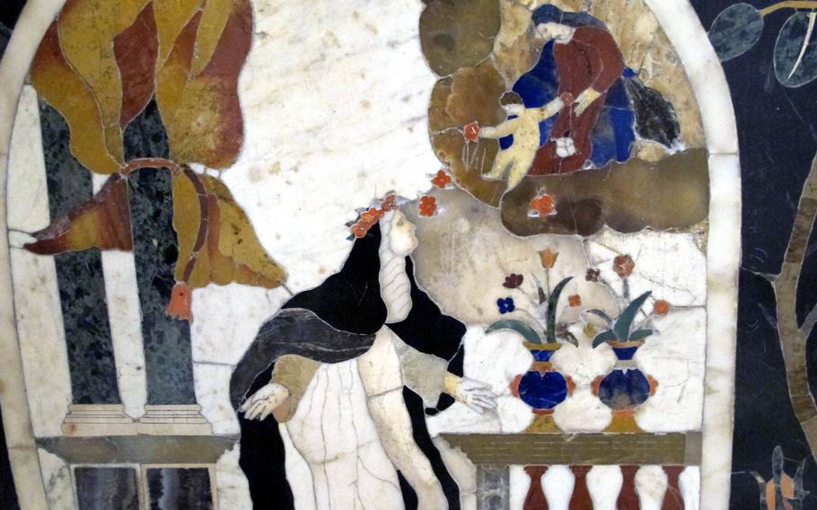 Among the beautiful art works in Vicenza's Chiesa di Santa Corona is the fabulous mosaic altar depicting scenes from the Bible. This pretty scene might or might not be the baby Jesus tossing roses to his grandmother, Saint Anne.