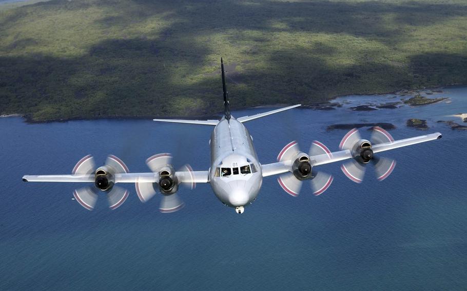 A P-3K Orion flies over Rangitoto Island near Auckland, New Zealand, in 2006.