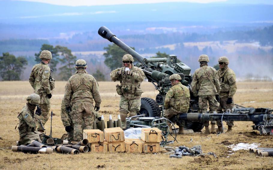 U.S. Army paratroopers assigned to Battery B, 4th Battalion, 319th Airborne Field Artillery Regiment, 173rd Airborne Brigade, prepare for a fire mission with M119 105 mm howitzers during an exercise, March 20, 2018. The Army announced a plan Friday to add more firepower in Germany by creating new short-range air defense units, adding about 1,500 soldiers as well as their families by 2020.