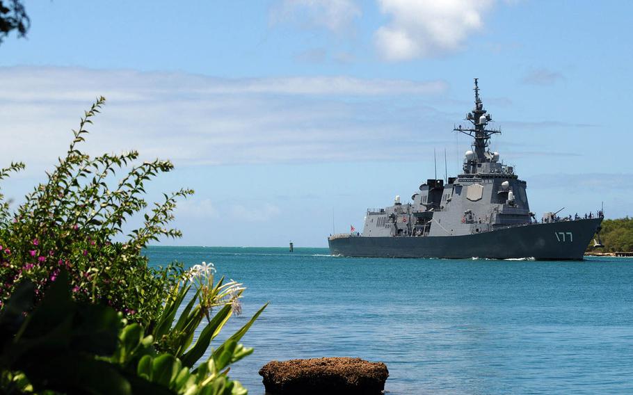The Japan Maritime Self-Defense Force guided-missile destroyer JS Atago returns to Joint Base Pearl Harbor-Hickam, Hawaii, after participating in Rim of the Pacific sea drills in 2010.
