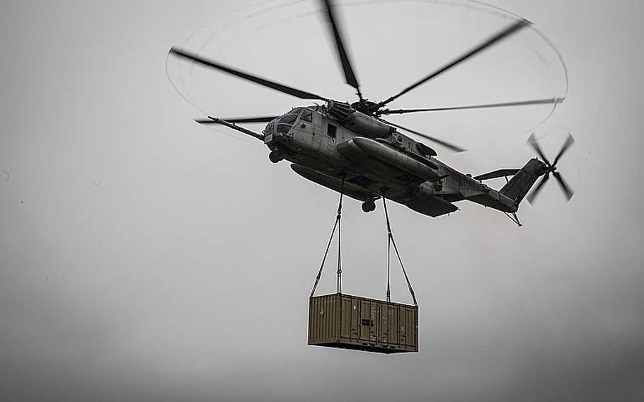 A CH-53E Super Stallion assigned to Marine Heavy Helicopter Squadron 462 hovers above Draughon Range near Misawa Air Base, Japan, Aug. 21, 2017.