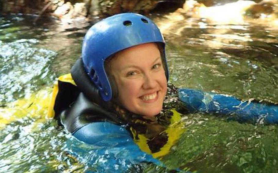 Stars and Stripes reporter Caitlin Doornbos swims during a canyoneering expedition with Canyons in Japan's Gunma Prefecture.
