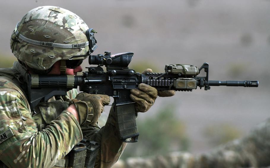 A soldier from the 10th Mountain Division fires an M4 rifle during team live-fire training on a range in Djibouti, June 23, 2018. The U.S. Army Tank-automotive and Armaments Command has found a fix for a glitch in the M4/M4A1 assault rifles, which causes the weapon to unintentionally fire.