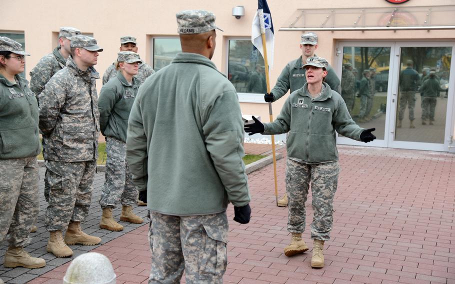A captain gives a briefing on pet safety to the Army boxing team from Wiesbaden, Clay Kaserne, in 2013.