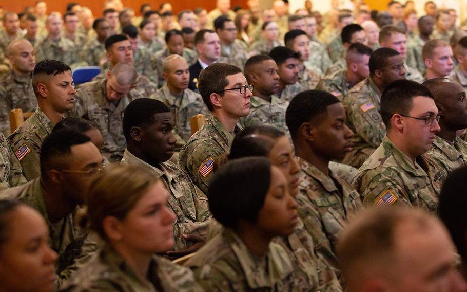 2nd Infantry Division soldiers pay their respects during a memorial ceremony at Camp Humphreys, South Korea, Monday, Oct. 1, 2018.