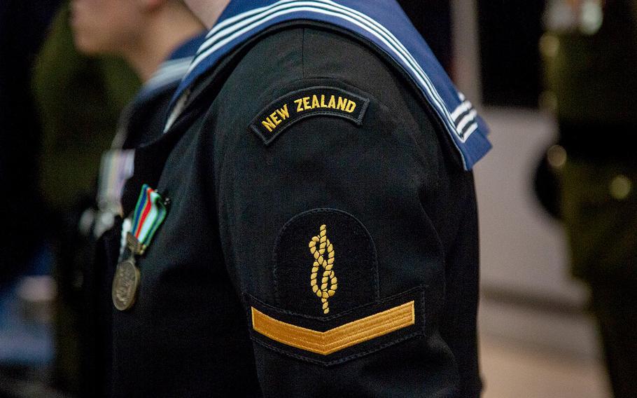 A New Zealand sailor takes part in a repatriation ceremony at Osan Air Base, South Korea, Friday, Oct. 5, 2018.