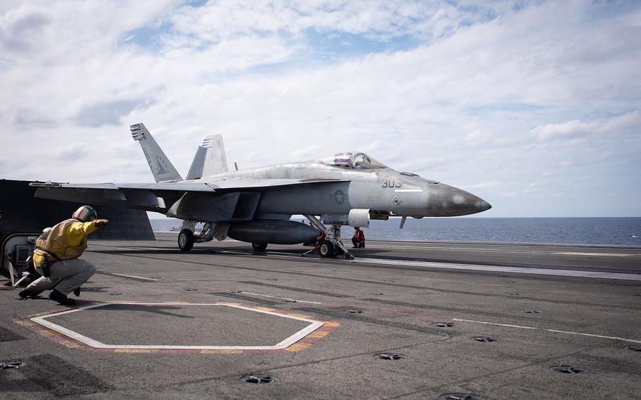 An F-18 Super Hornet prepares to take off from the flight deck of the USS Ronald Reagan during Keen Sword drills, Saturday, Nov. 3, 2018.