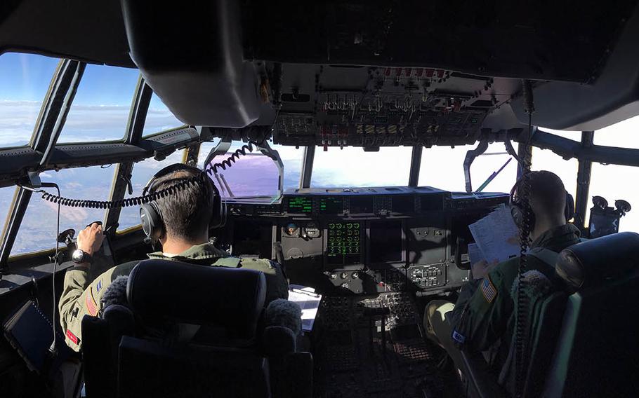 A C-130J Super Hercules assigned to the 374th Airlift Wing at Yokota Air Base, Japan, flies to Tsuiki Air Base in Fukuoka prefecture to collect 70 Japanese paratroopers for a Keen Sword training drill, Sunday, Nov. 4, 2018.