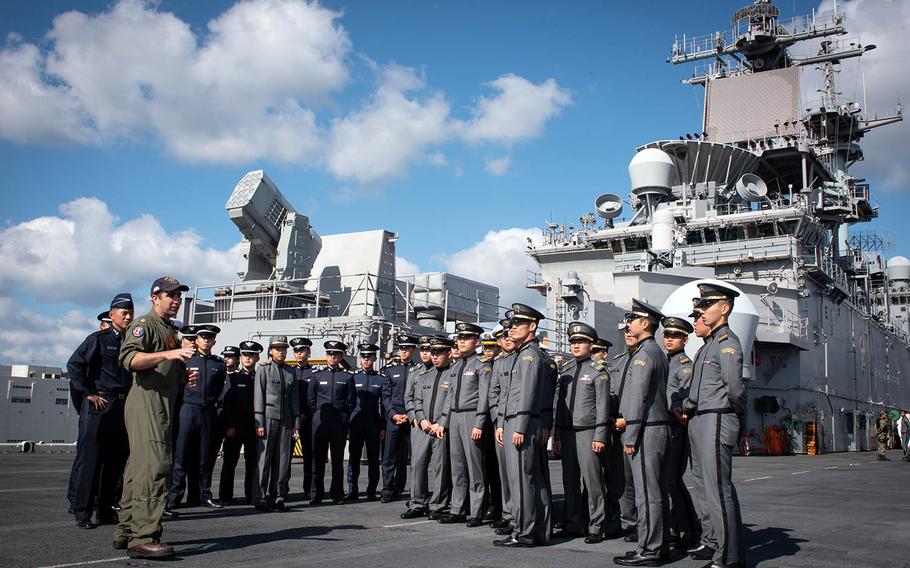 Midshipmen and cadets from South Korea's Army, Navy and Air Force academies visit the USS Wasp at Sasebo Naval Base, Japan, Tuesday, Nov. 6, 2018.